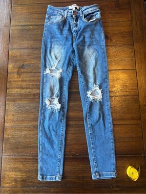Distressed Slim Blue Jeans